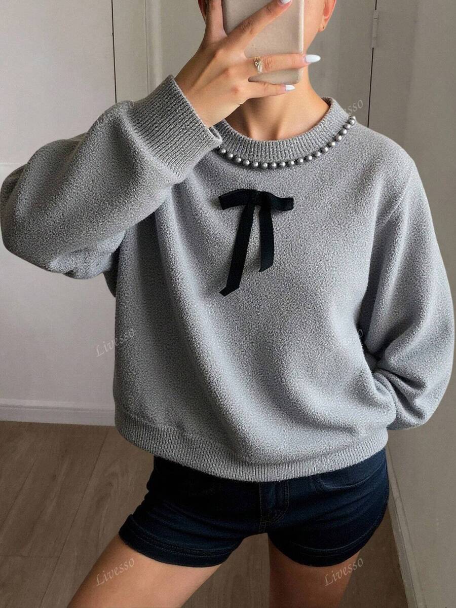 Amarisse | het parelgrijze truitje vol subtiele verfijning