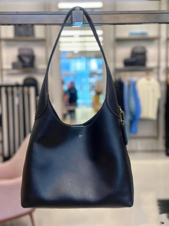 Lunaria | Een Tas waar Vorm en Elegantie  Samensmelten